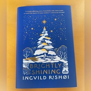 Brightly Shining Hardcover Book